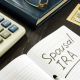 a notepad with spousal IRA written on it