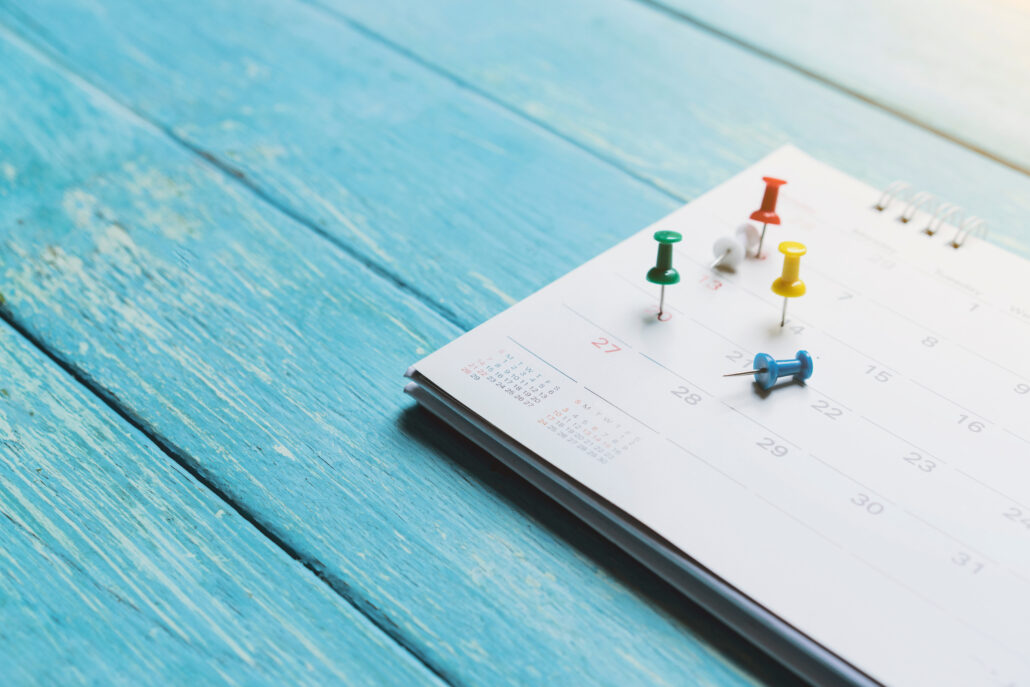 calendar with colorful push pins showing January estimated tax planning deadlines