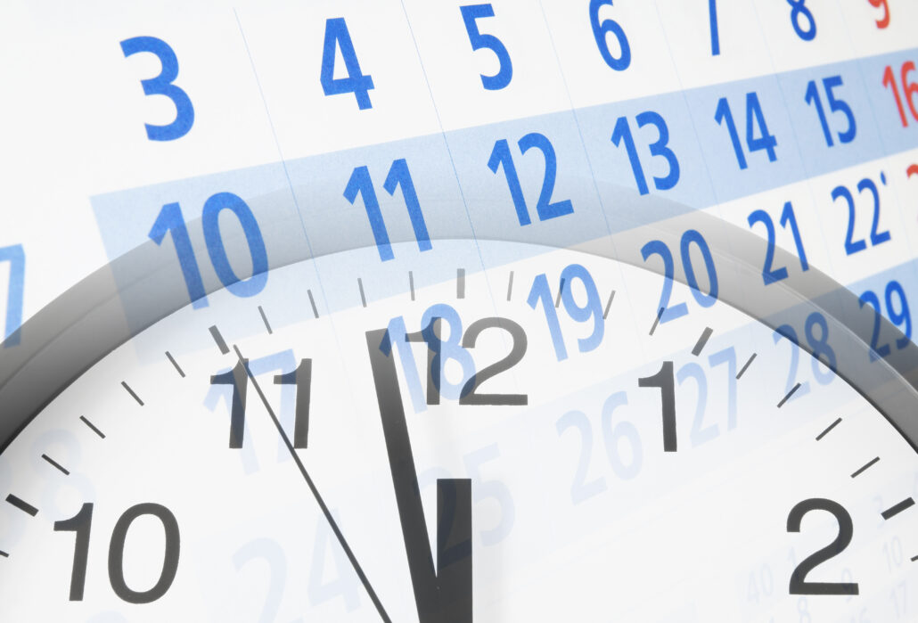 Calendar and clock image representing important March IRS deadlines for high-income business owners